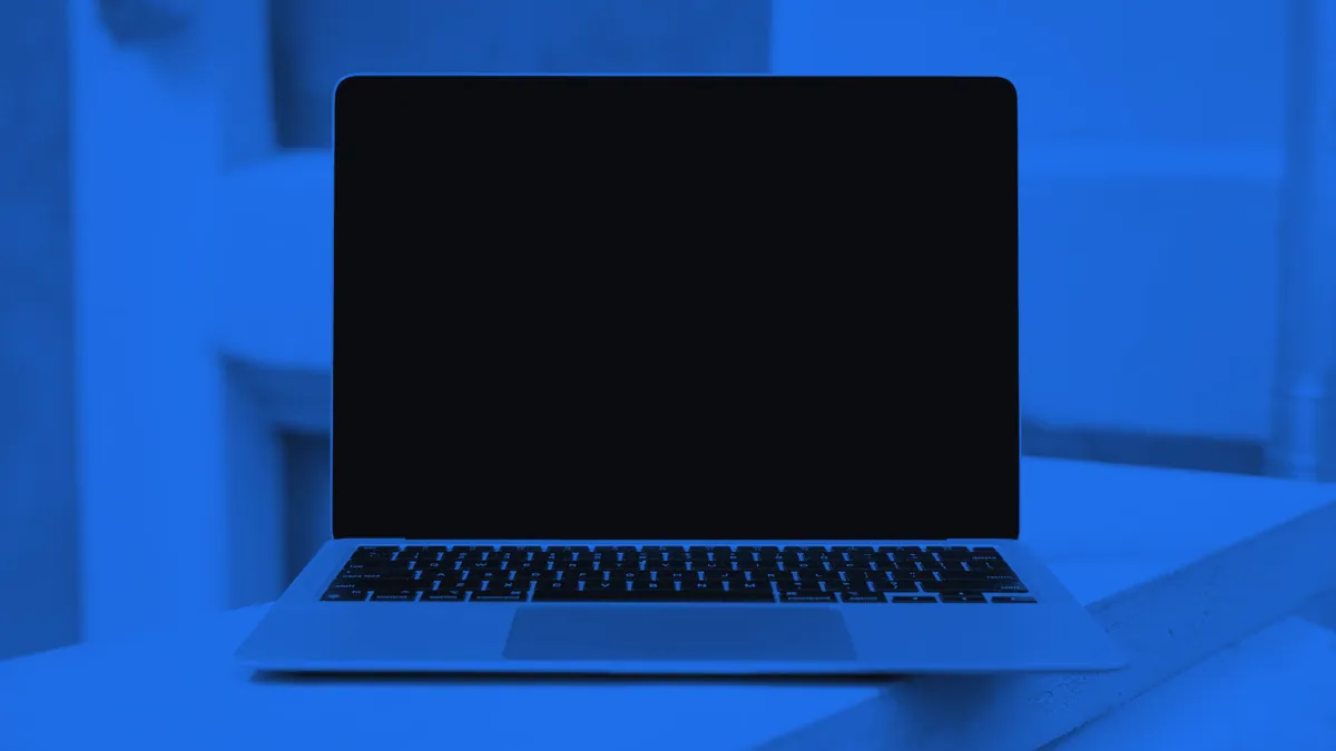 A modern laptop running speech synthesis software.